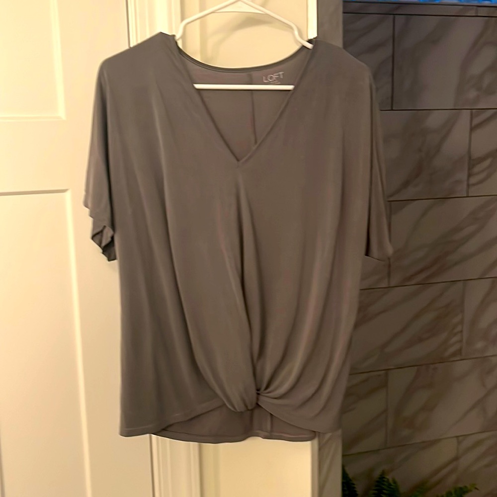 Ann Taylor loft size medium gray top with twist front.